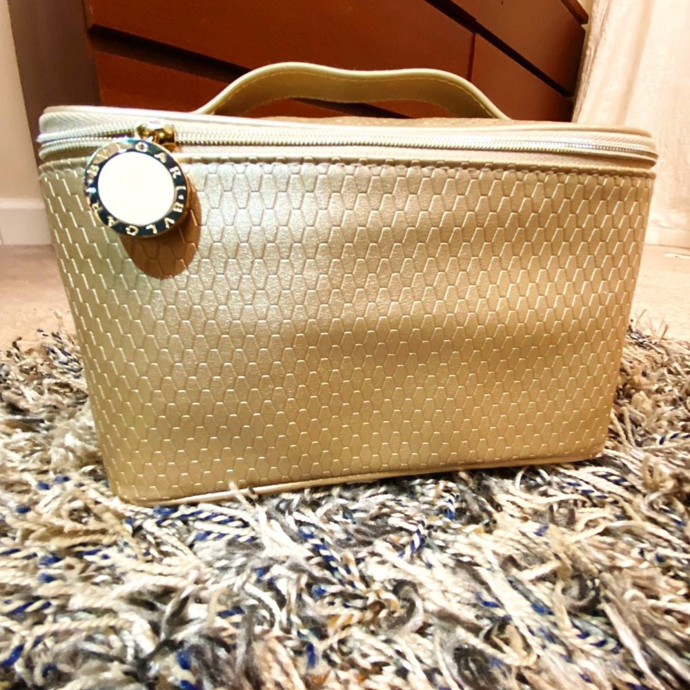 Bvlgari • Gold makeup cosmetics travel bag